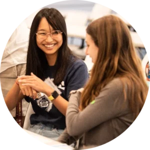 Two female students conversing