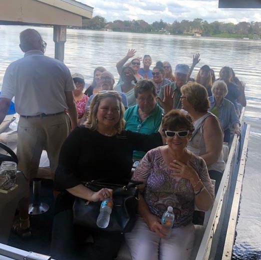 participants of the Aphasia Family taking a lake tour on a boat