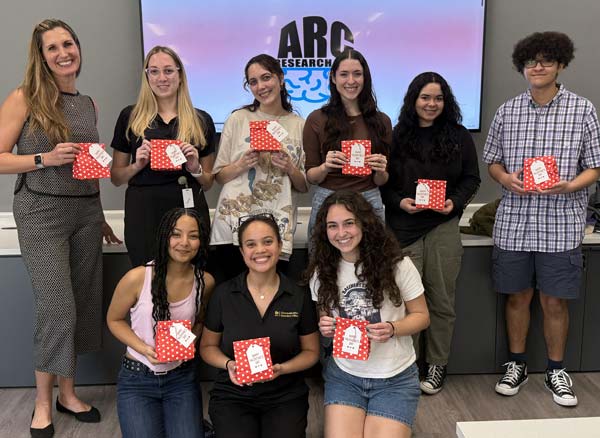 ARC students in a group shot all holding awards