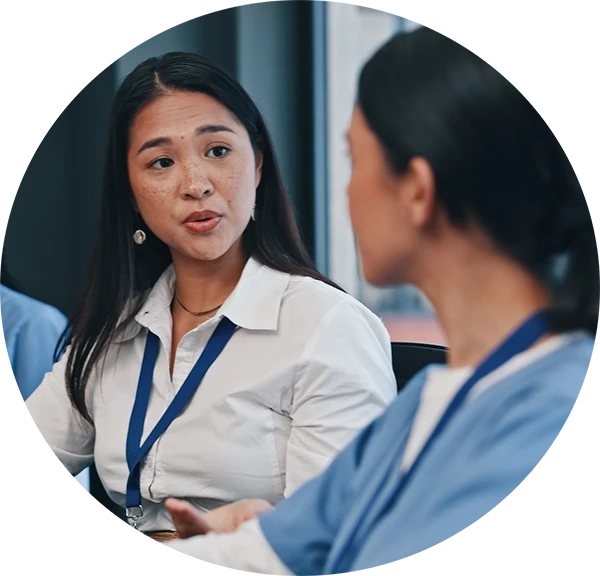 HMI-Research-Partners-circle Two women in conversation