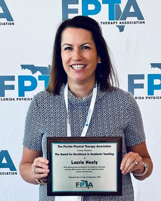 Neely Receives FPTA Outstanding Educator Award