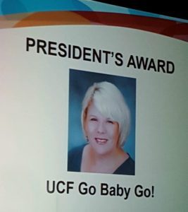 Headshot of Jennifer Tucker titled "President's Award UCF Go Baby Go!"