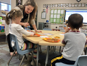 teacher working with children