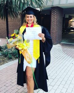 Massiel Hernandez ’17 ’18 MSW at her MSW graduation 