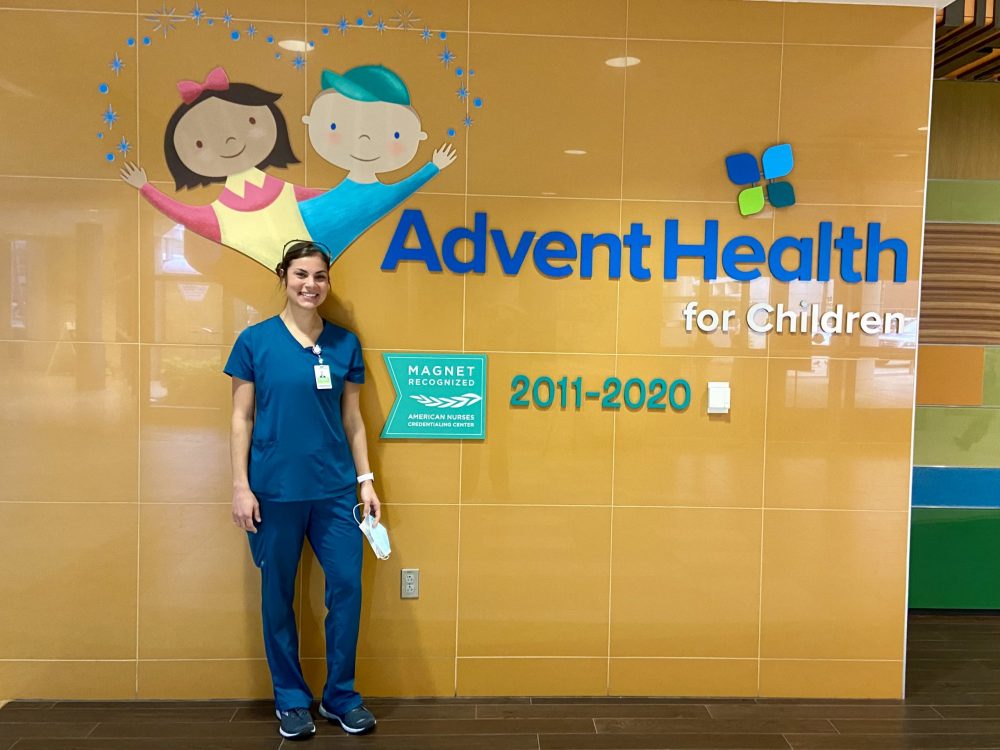 Melinda Geisel in front of AdventHealth for Children wall.