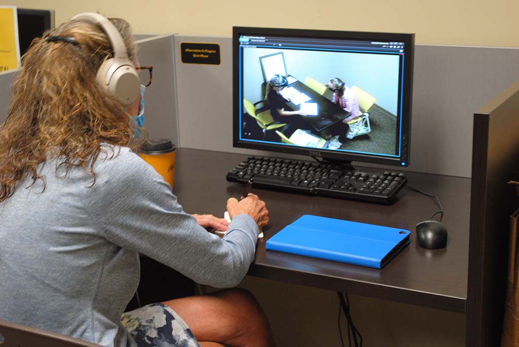 person observing computer