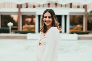 Lauren Lamontagne in front of the Reflection Pond.