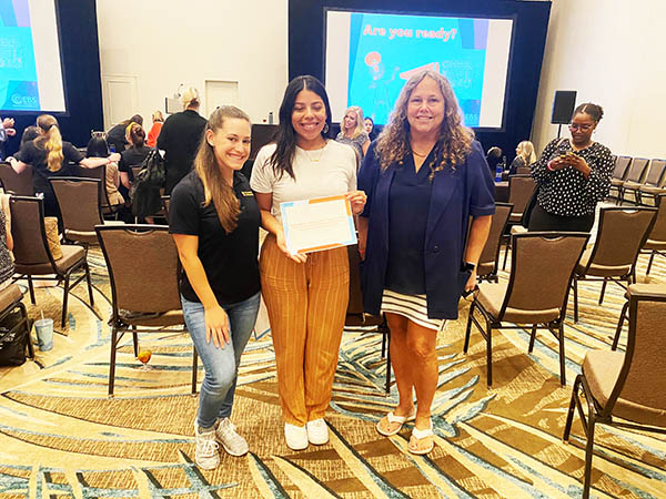 Nicole Rodriguez, Rocio Velasquez and Nancy Harrington certificate of first place in the poster presentation