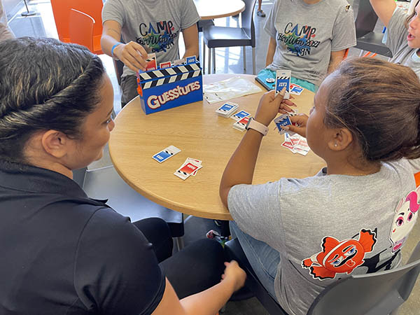 group of campers playing Guesstures