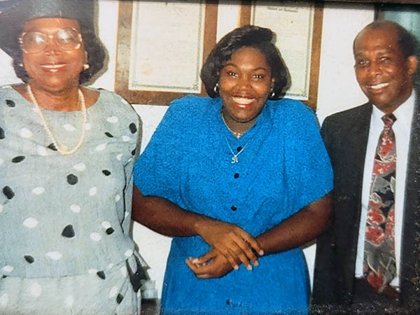 Shirley and Ralph Williams stand with Rachel Williams.
