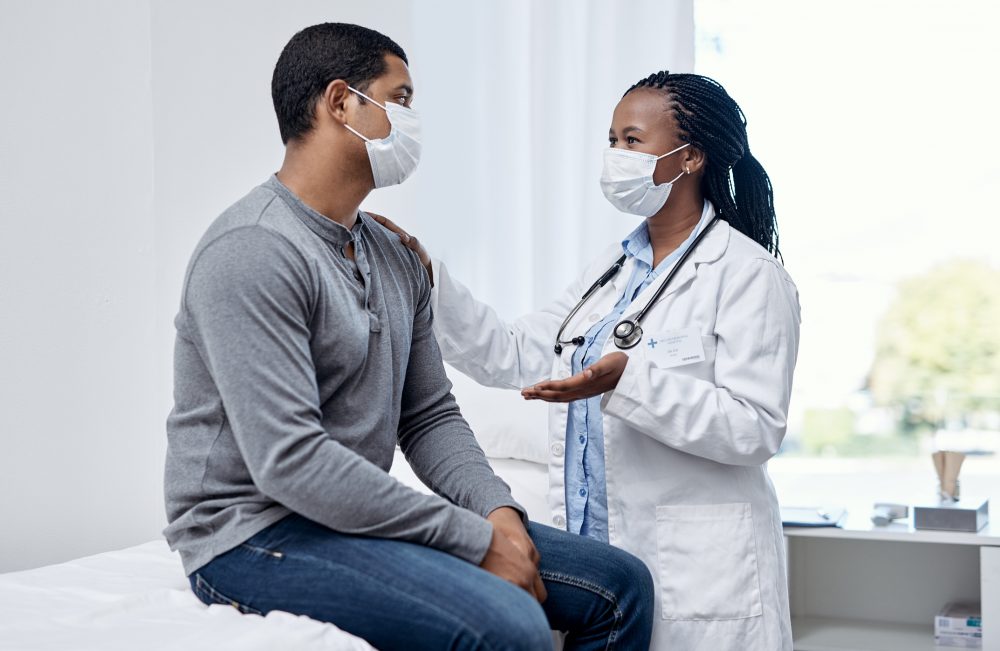 doctor speaking to patient