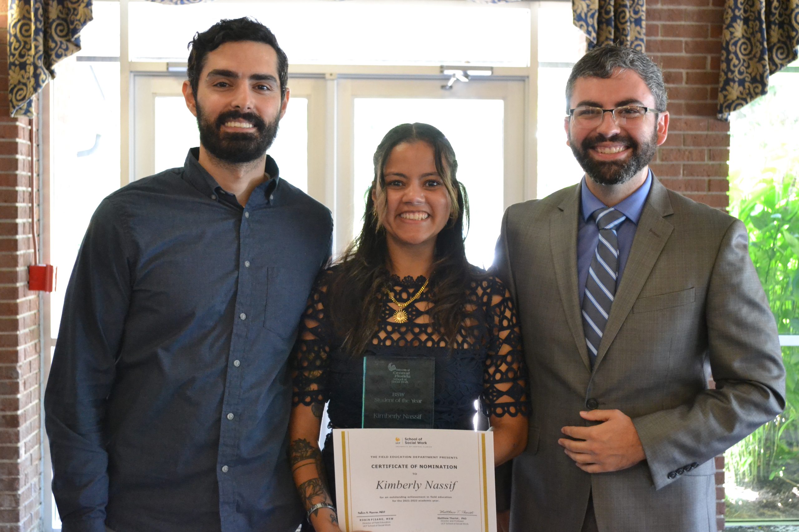 Kimberly Nassif with award