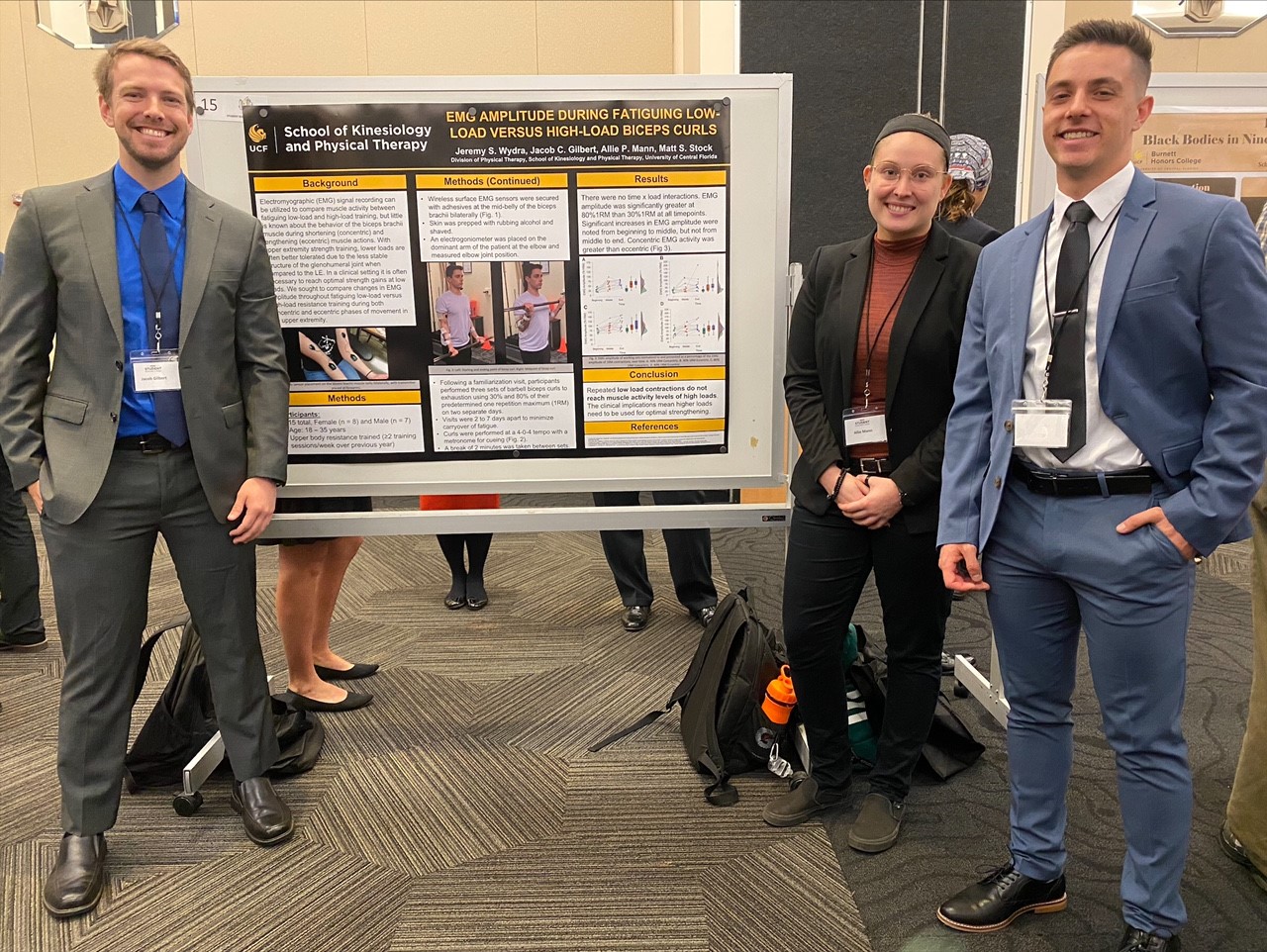 PT researchers with poster