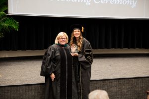 Megan Lang with award