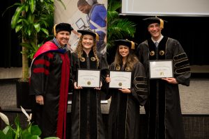 Chandler Shiley, Samantha Viana, Vicki Roach with awards