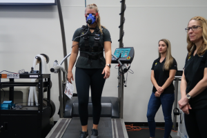 Student participant on treadmill being tested for research