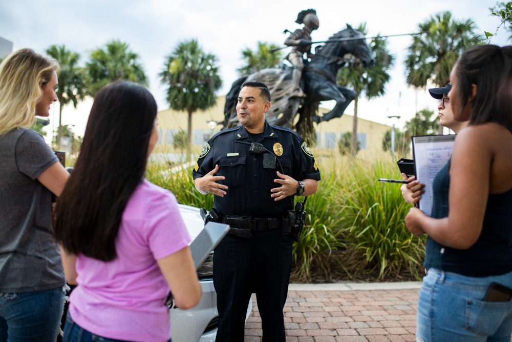 UCF PD talking to UCF students.