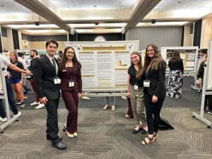 students at research symposium