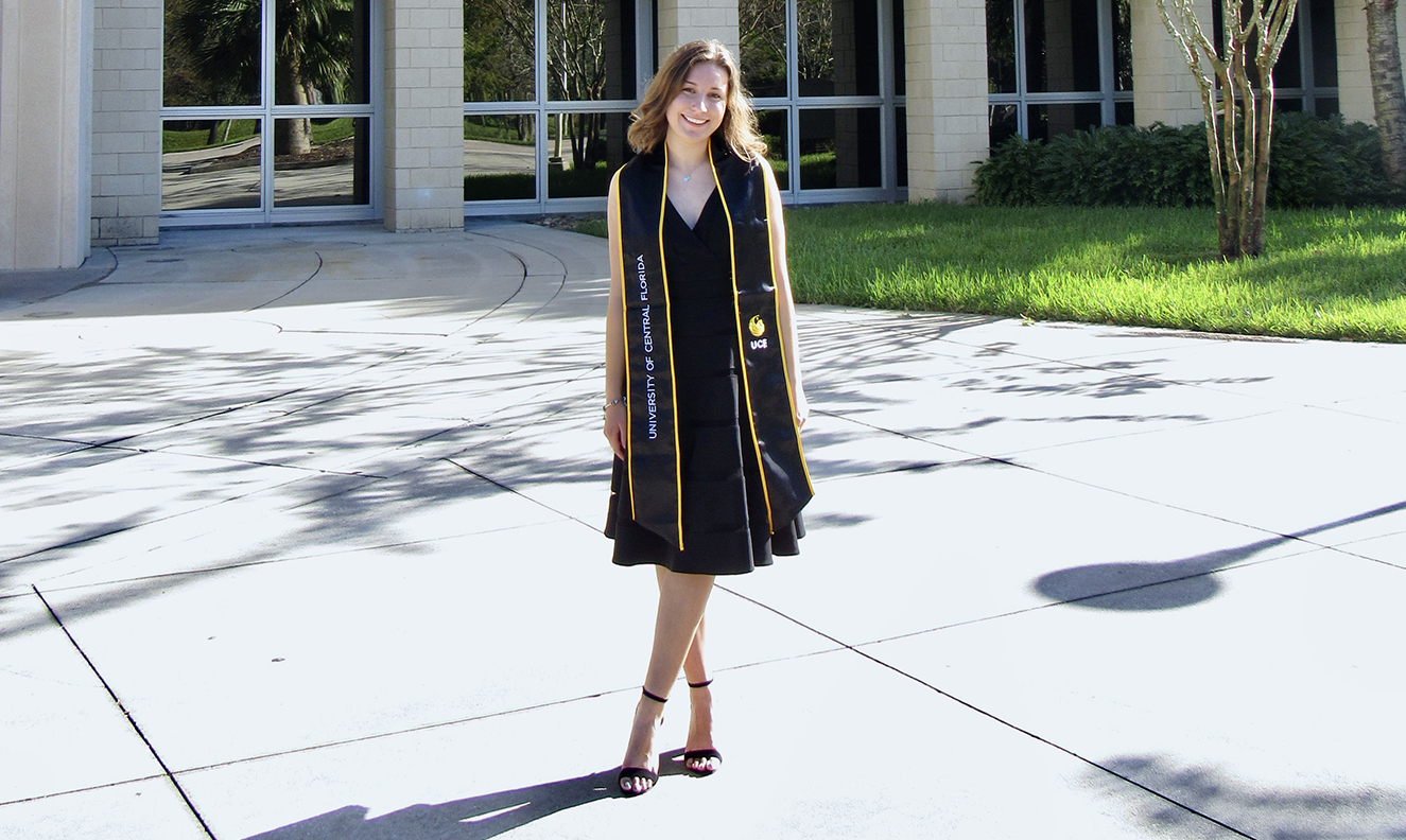 Danielle Saunders stands in front of the UCF Health Sciences I building