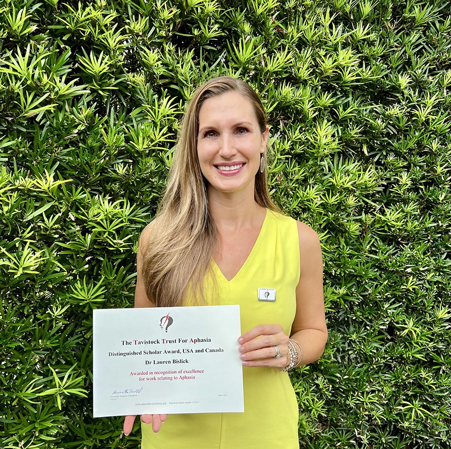 Lauren Bislick with award certificate.