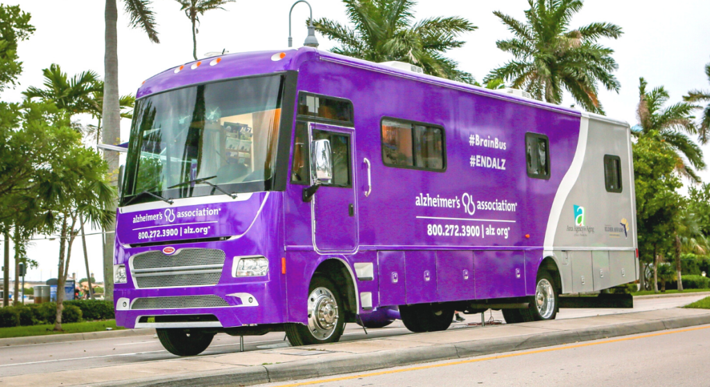 purple bus with Alzheimer's Association logo
