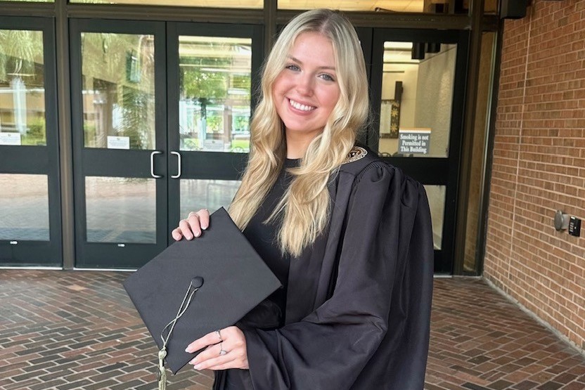 Emma Herring in cap and gown