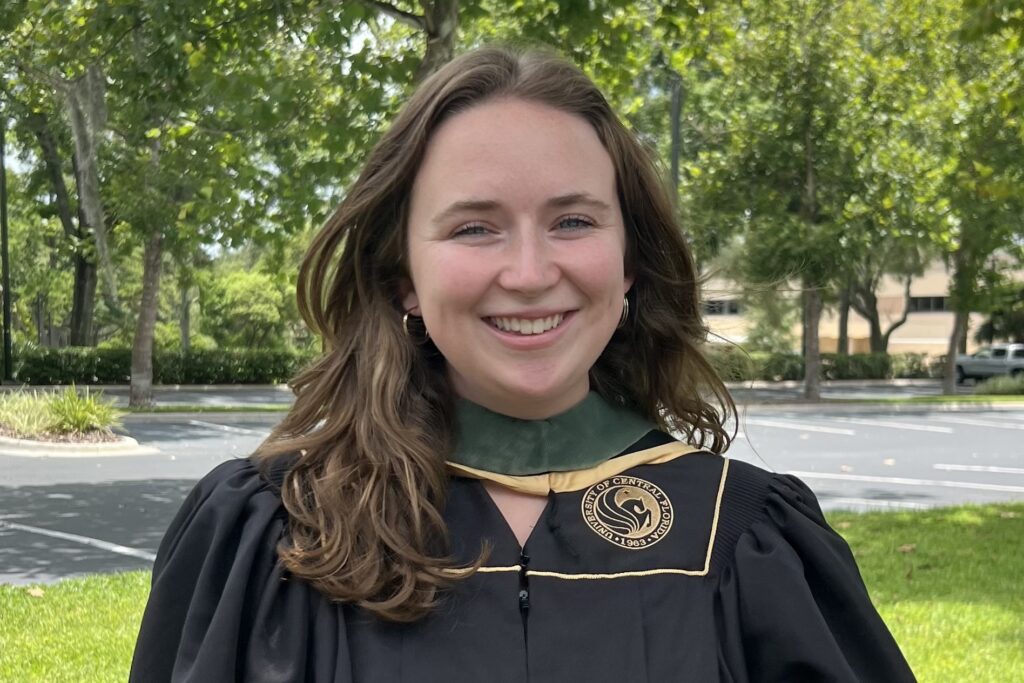 Mary Grace in graduation regalia