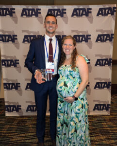 Tyler Killinger ’16, pictured here with his wife Kristen Taylor Killinger ’17, was named Professional Athletic Trainer of the year by the Athletic Trainers’ Association of Florida. 