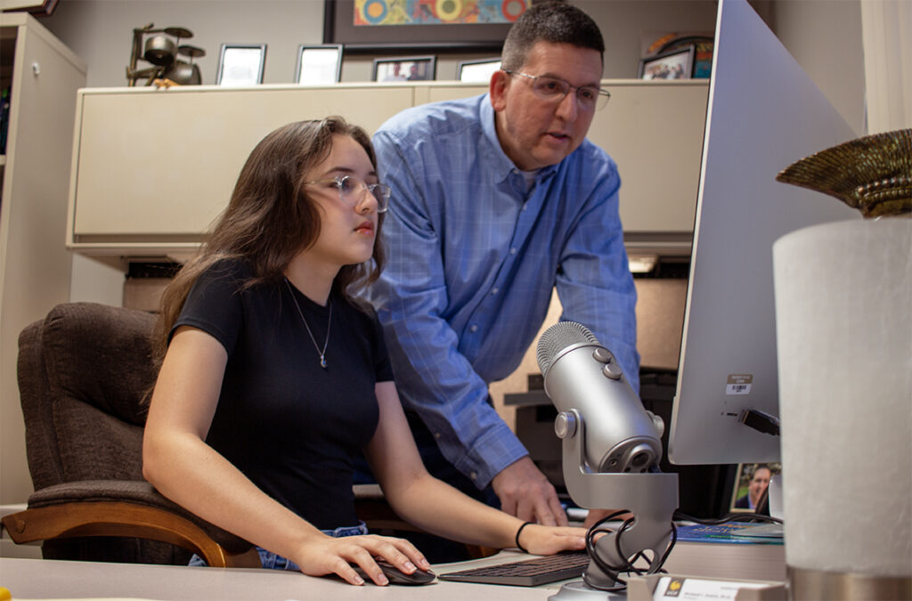 Professor Richard Zraick working with undergraduate student Kelly Clevenger.