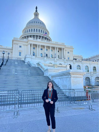 Residency graduate DPT Chloe Artrip stands outside of Capital Hill in Washington, D.C.