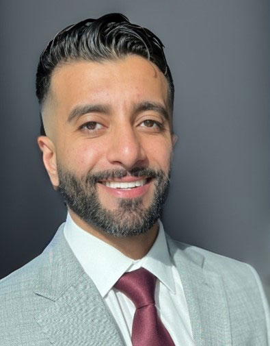 Previous UCF and Orlando Health neurologic residency graduate DPT Uzair Hammad smiles for a headshot.