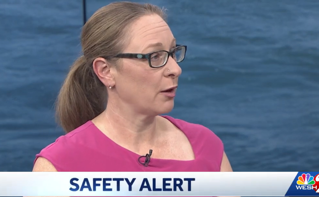Jennifer Cicia speaking on WESH 2 news with a banner at the bottom that reads, Safety Alert